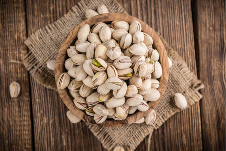 Pistachios in a wooden bowl