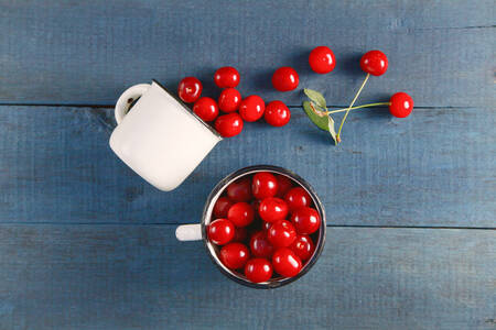 Cherry in a cup on the table