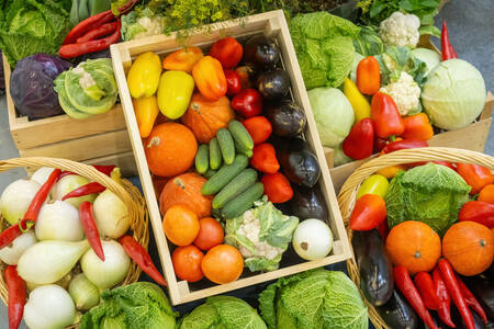 Organic vegetables in wooden boxes