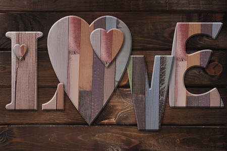 Wooden letters and hearts