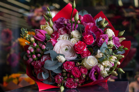 A bouquet of ranunculus and roses
