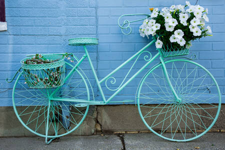 Blue bicycle with flowers