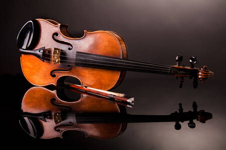 Antique violin on a dark background