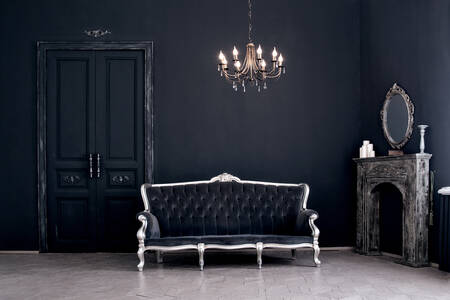 Black room with vintage furniture