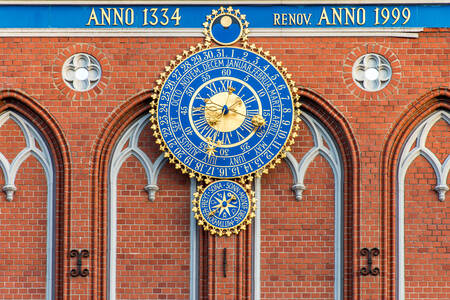 Clock on the facade of the house