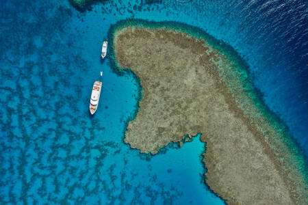 Boats and coral reef