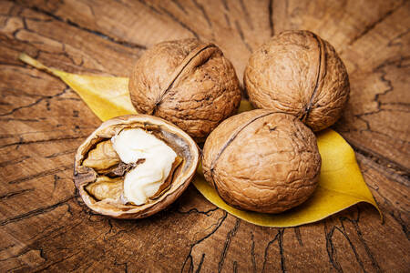 Walnuts on wooden background