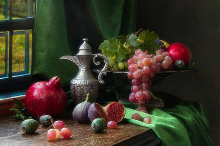 Fruits in a vase on the table