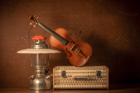 Violin and old lantern