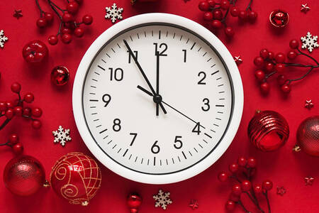 A clock against the backdrop of festive decor