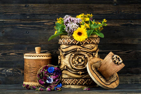 Medicinal flowers in a wooden vessel