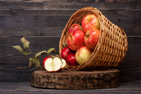 Red apples in a wicker basket