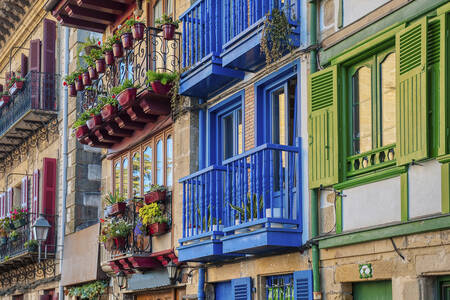 Colorful houses with bright balconies
