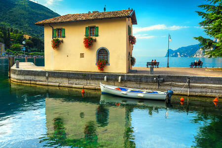 Boat in the harbor of Nago-Torbole