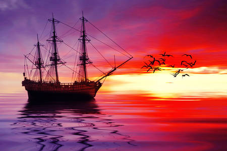 Zeilboot bij zonsondergang